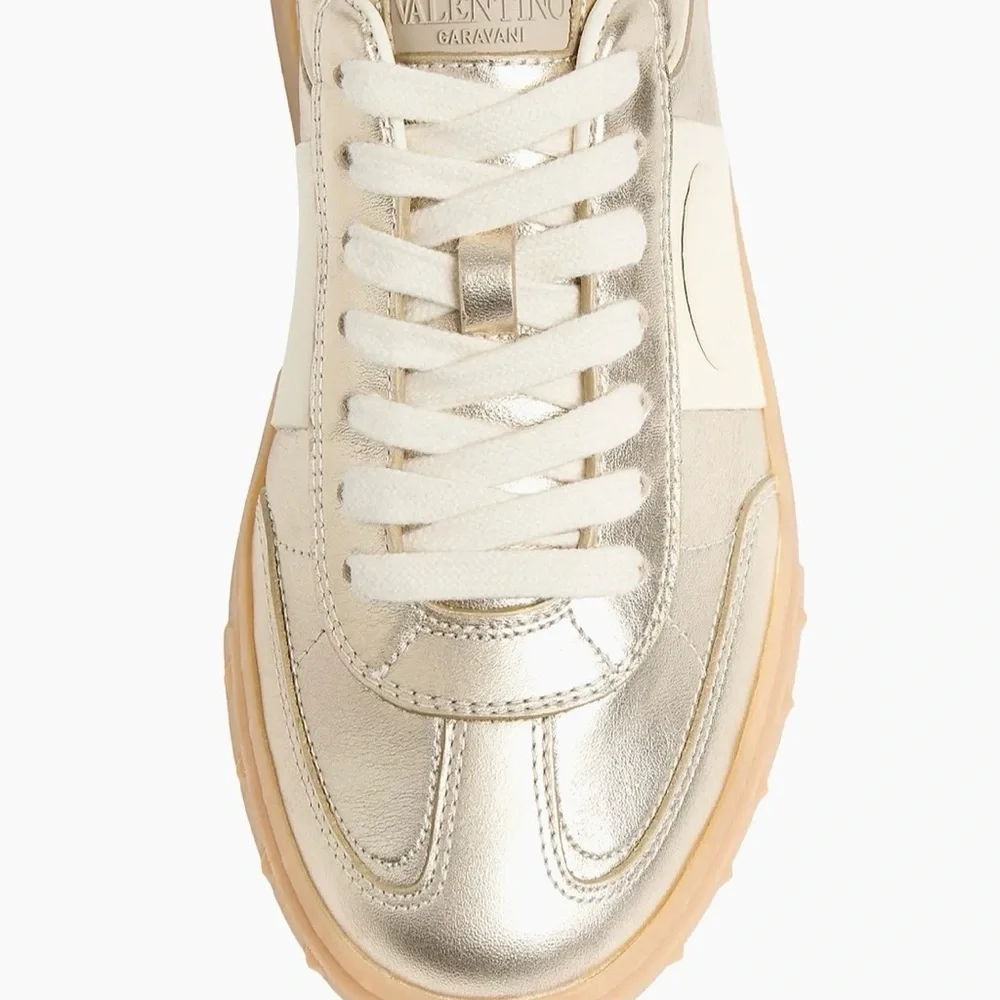 Valentino Garavani Women’s Upvillage Trainer Sneakers in Laminated Calfskin Gold